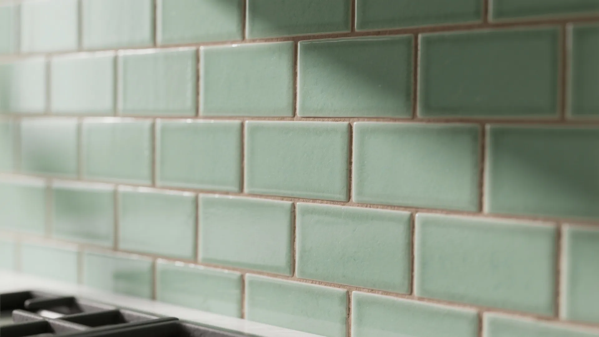 3. Matte Green Tiles with Warm Grout