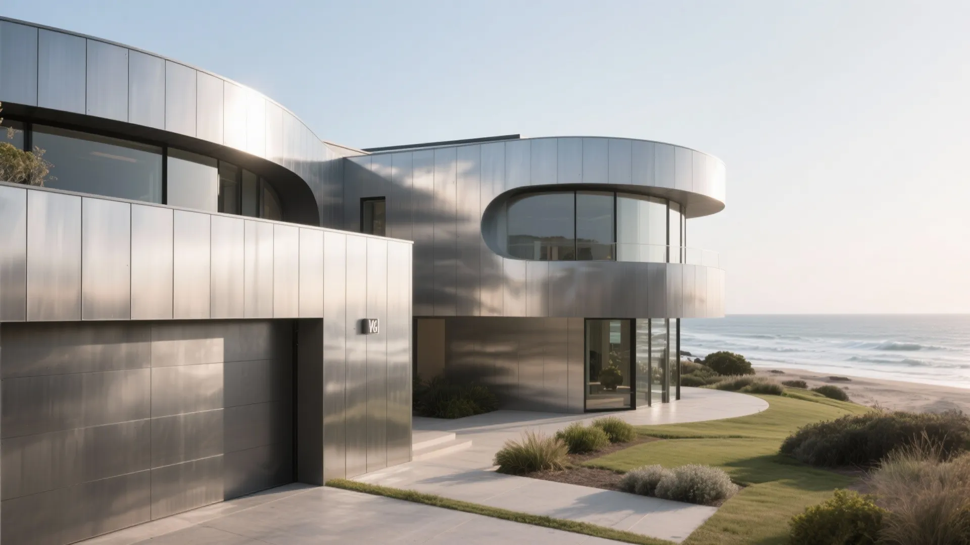Coastal home exterior finished with matte zinc metal cladding