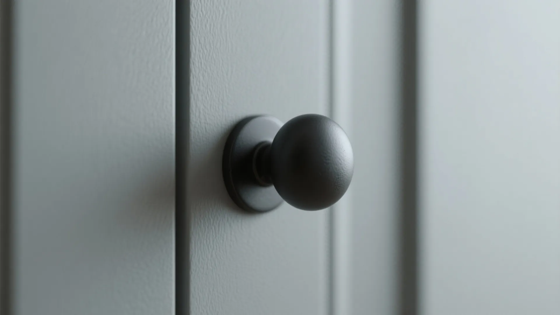 1. Matte round black knobs for a minimalist look
