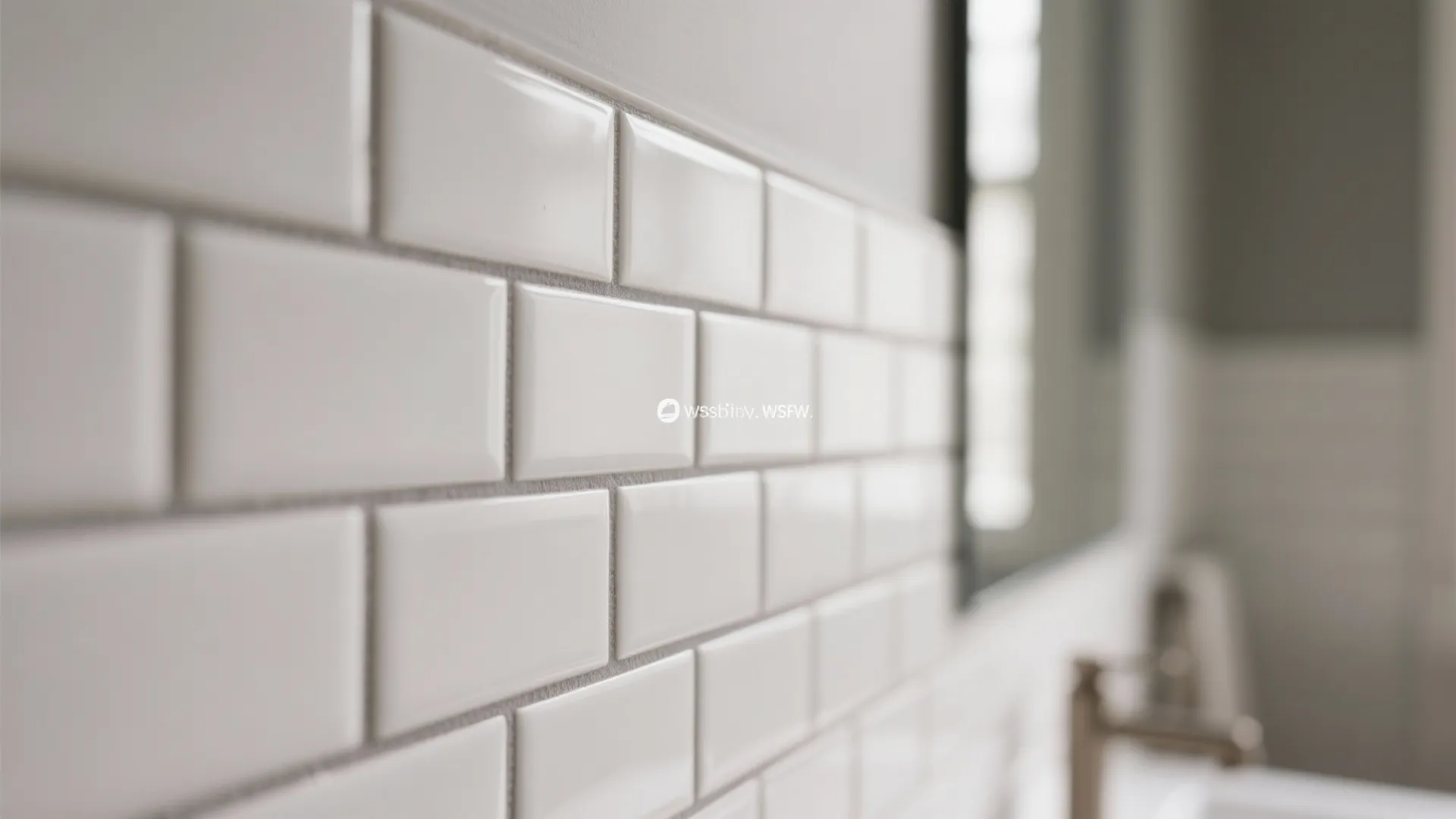 Detail of matte white subway tiles with soft gray contrasting grout in a 1/3 offset pattern, low-glare finish.