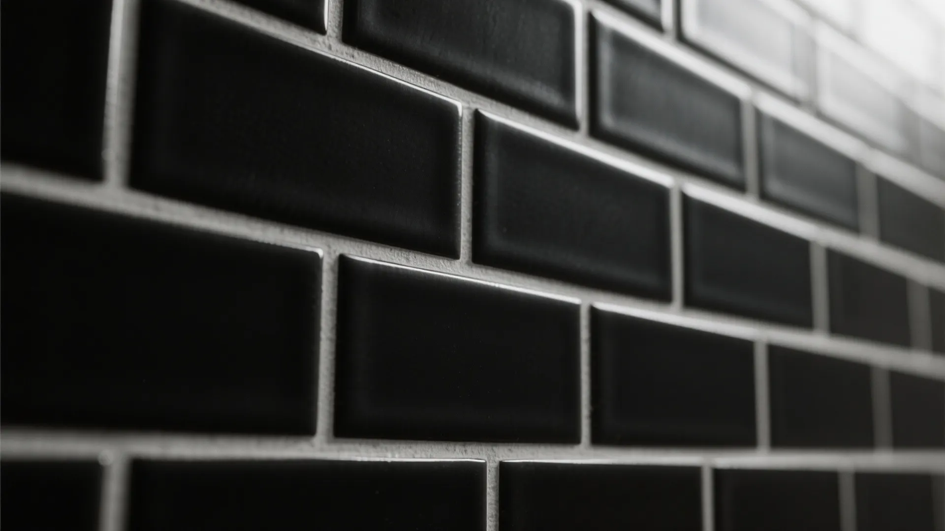1. Matte black subway tiles with bright grout