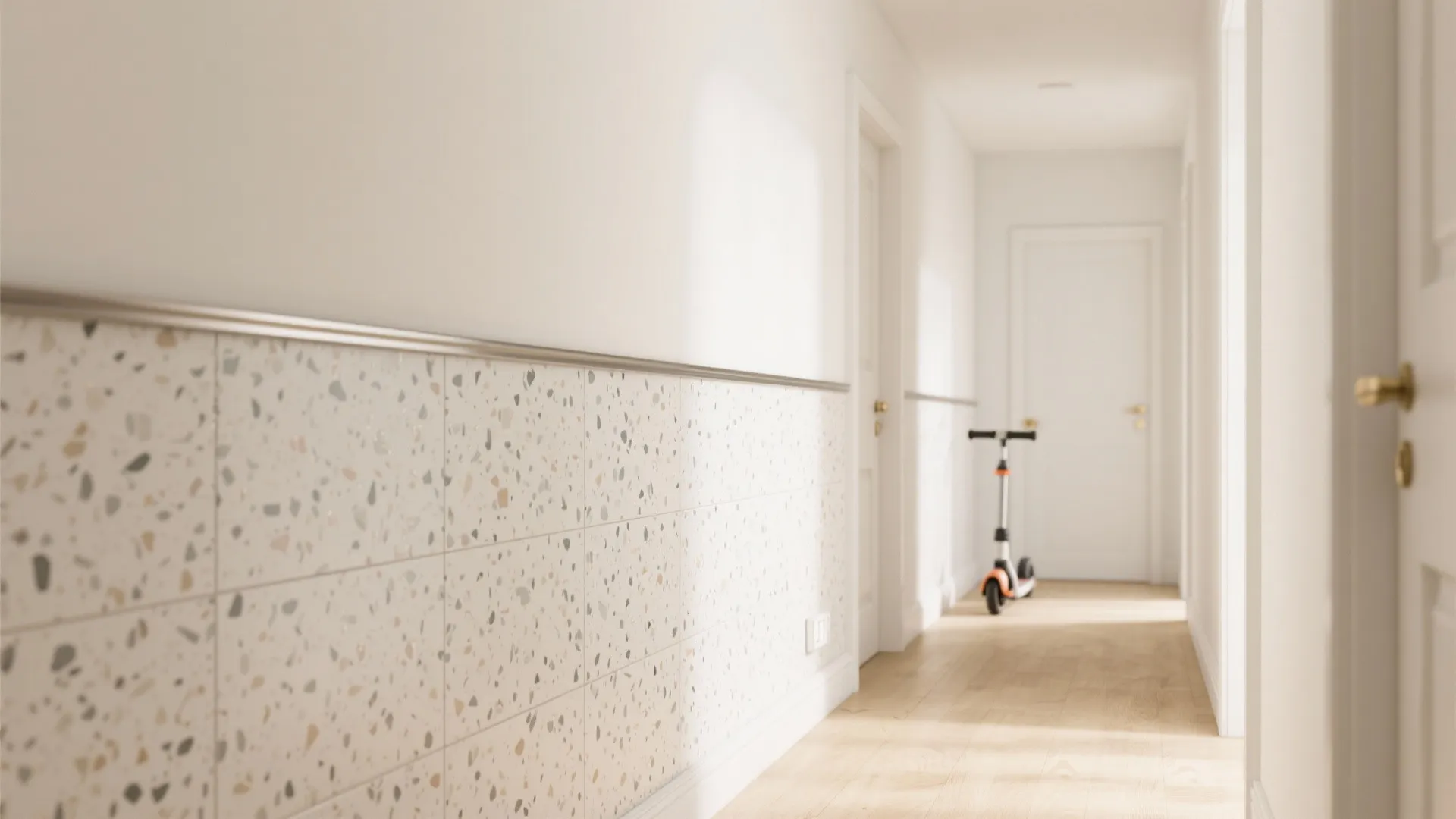Bright white hallway featuring decorative stone wall panel light wood flooring and a small scooter