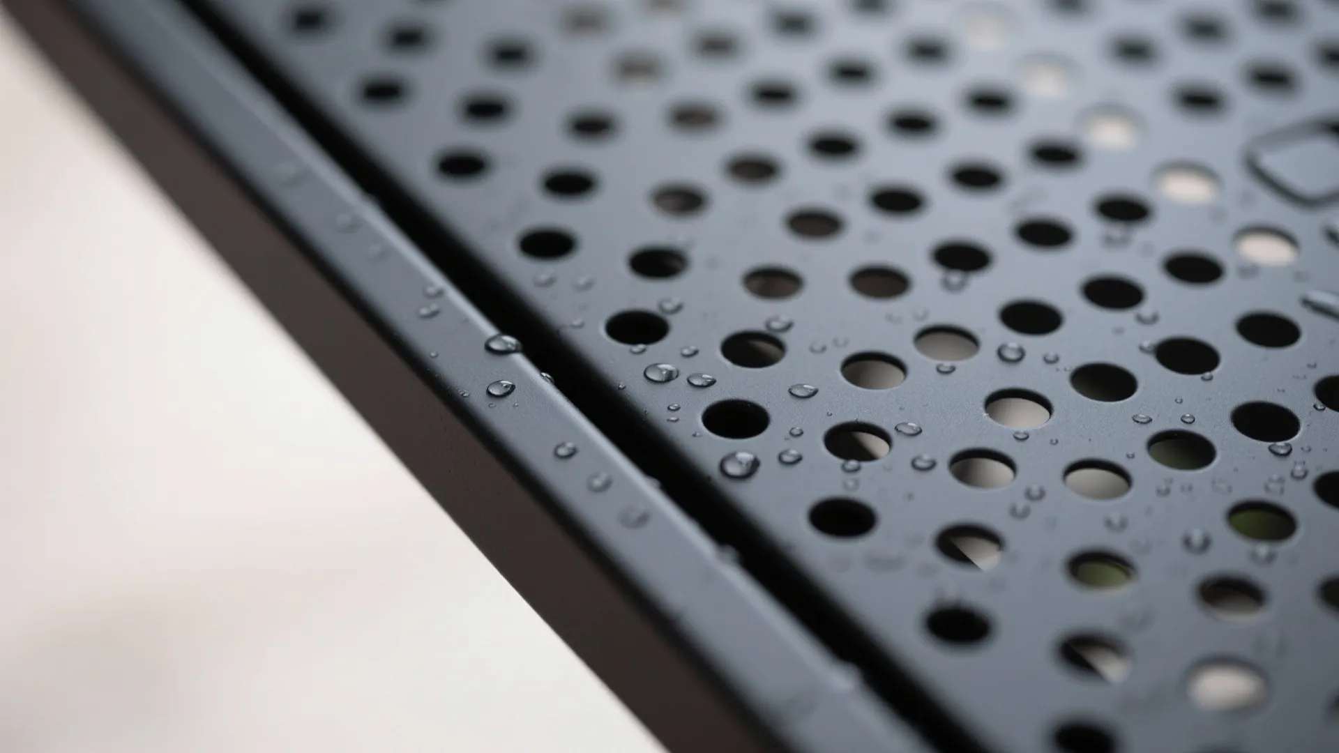 1) Minimal perforated metal jali for showers