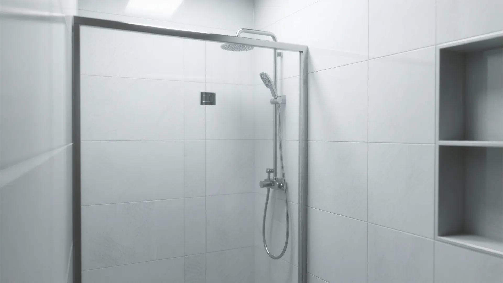 Modern white tiled shower area with silver shower head glass door and built-in wall shelf