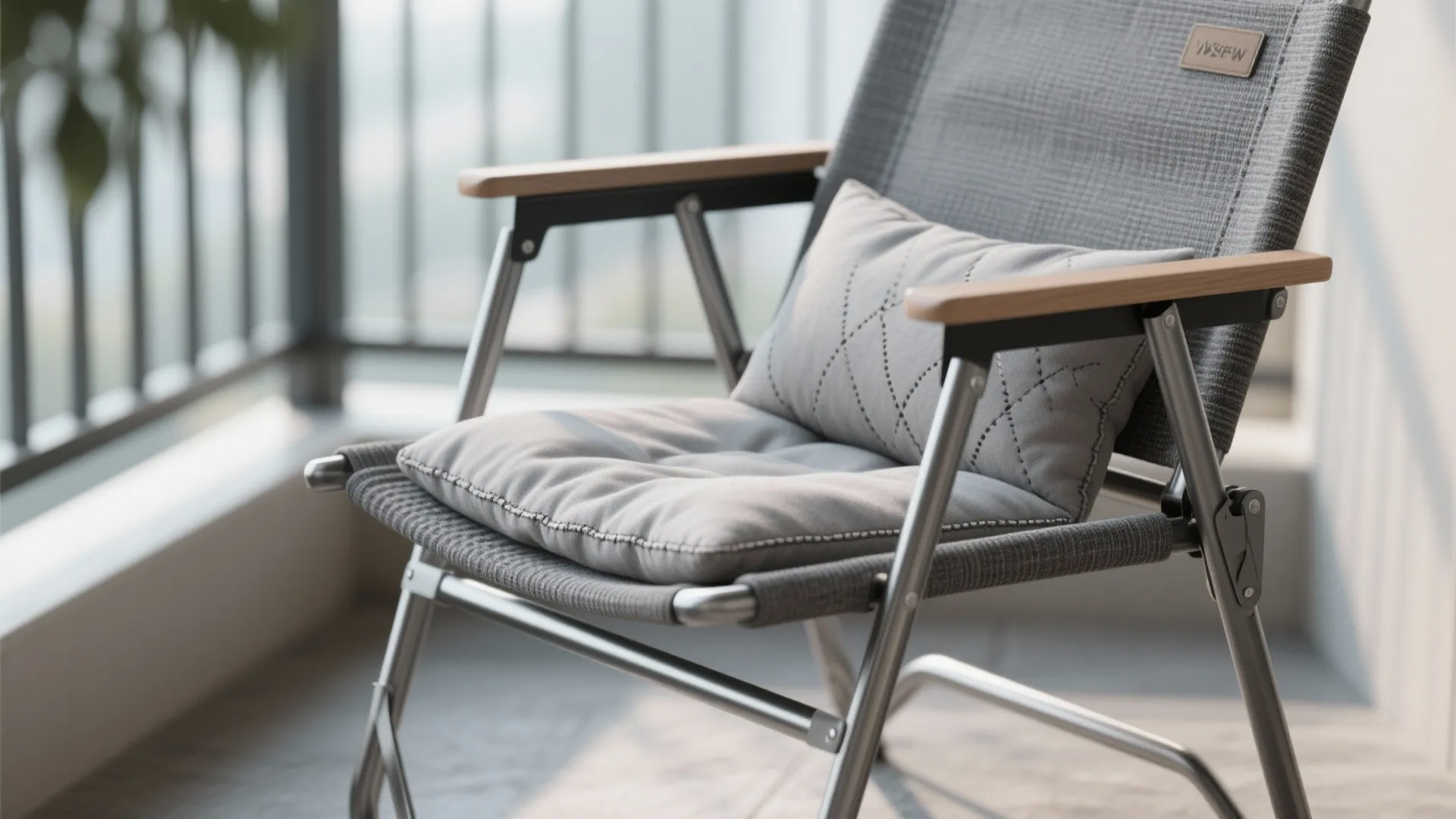 Designer metal frame with cushioned sling