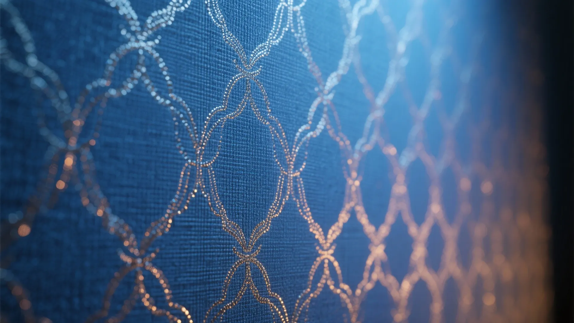 Close up of blue textured wallpaper with gold geometric pattern design for home interior decor