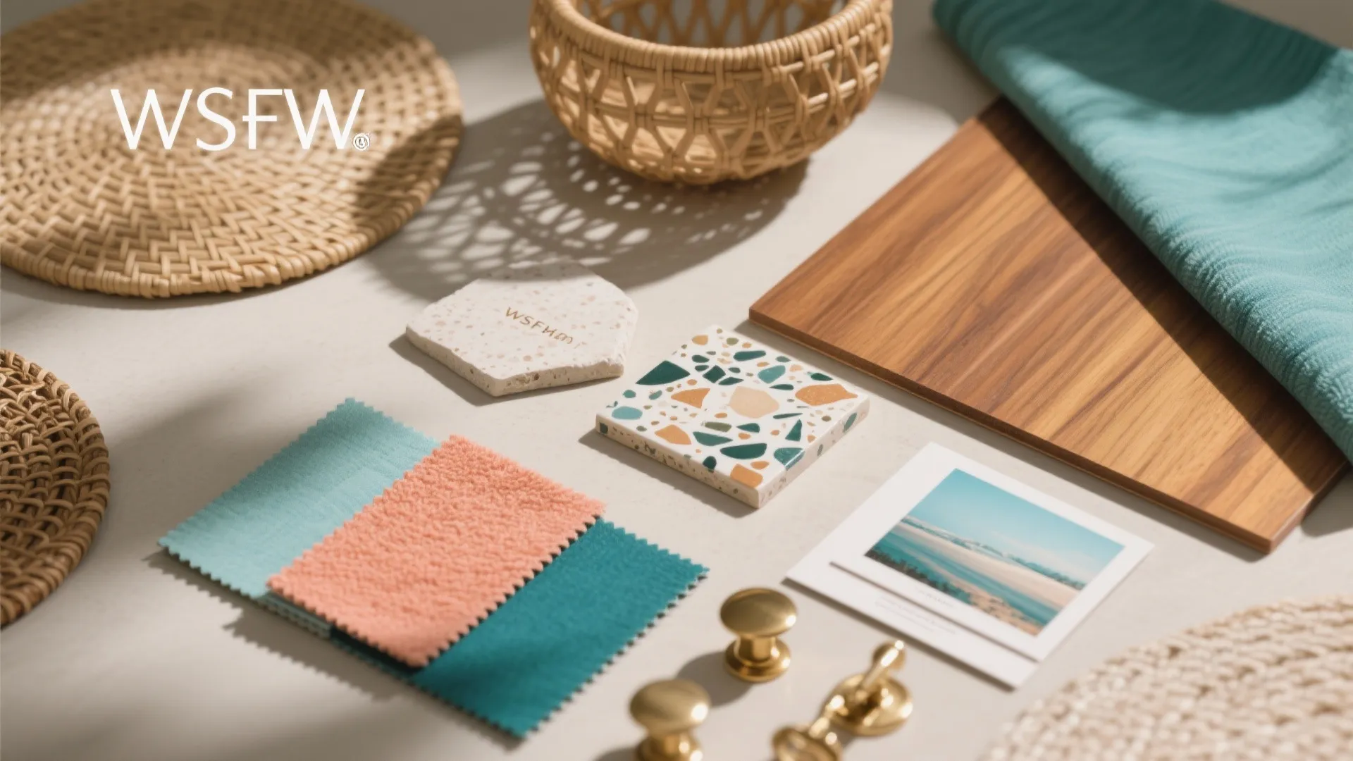 Flatlay of rattan, terrazzo tile, warm wood and coral-teal fabric swatches for a Miami boutique palette.