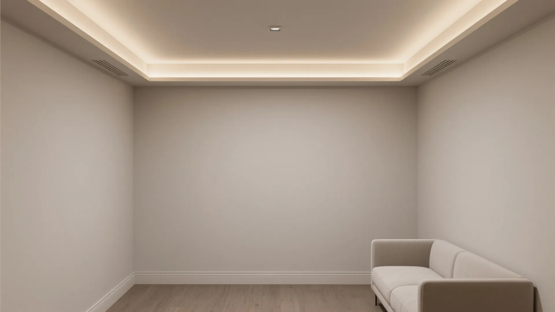 Minimalist room with a thin ceiling shadow reveal and subtle LED glow.