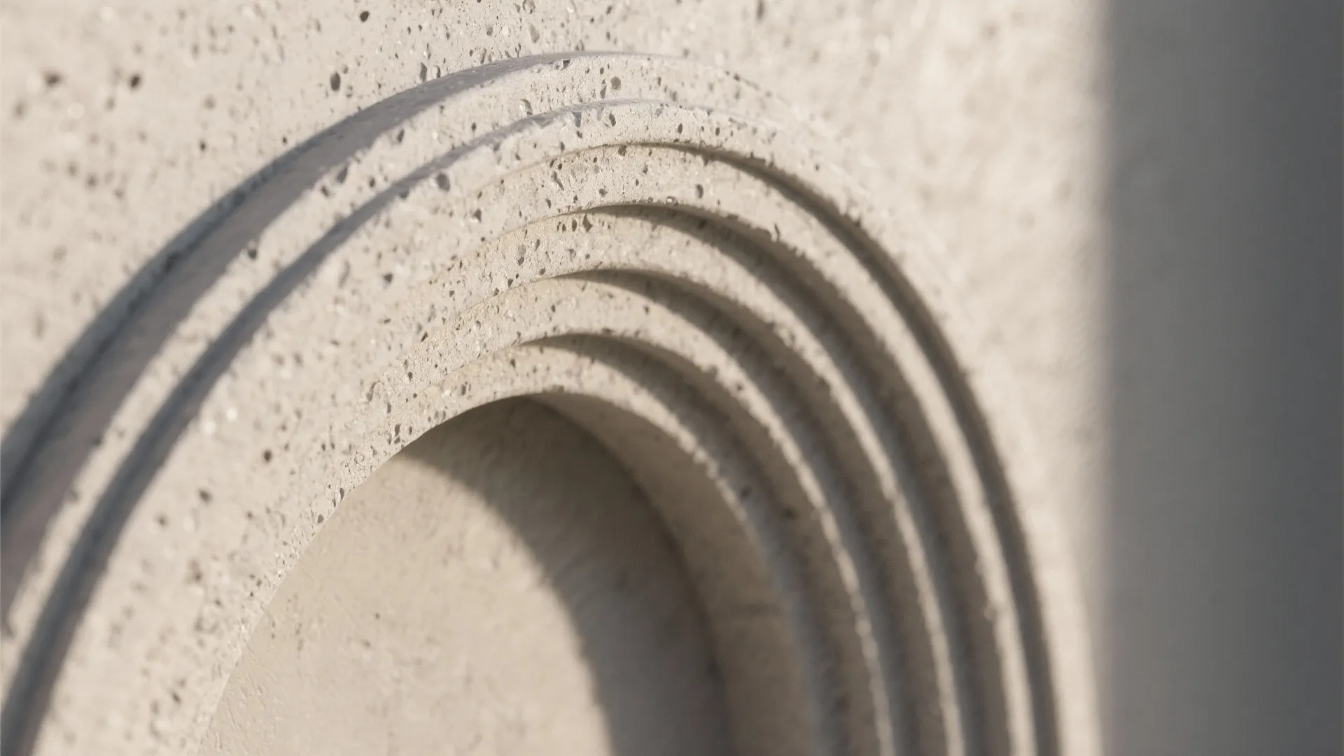 Textured arch with fluted plaster or microcement