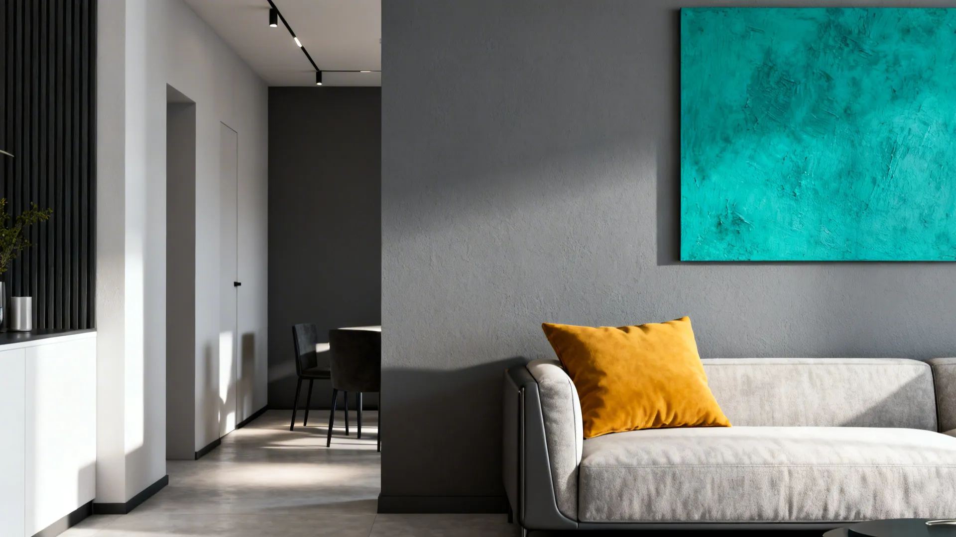 Mid-gray living room with a vivid mustard cushion and teal artwork as a color pop