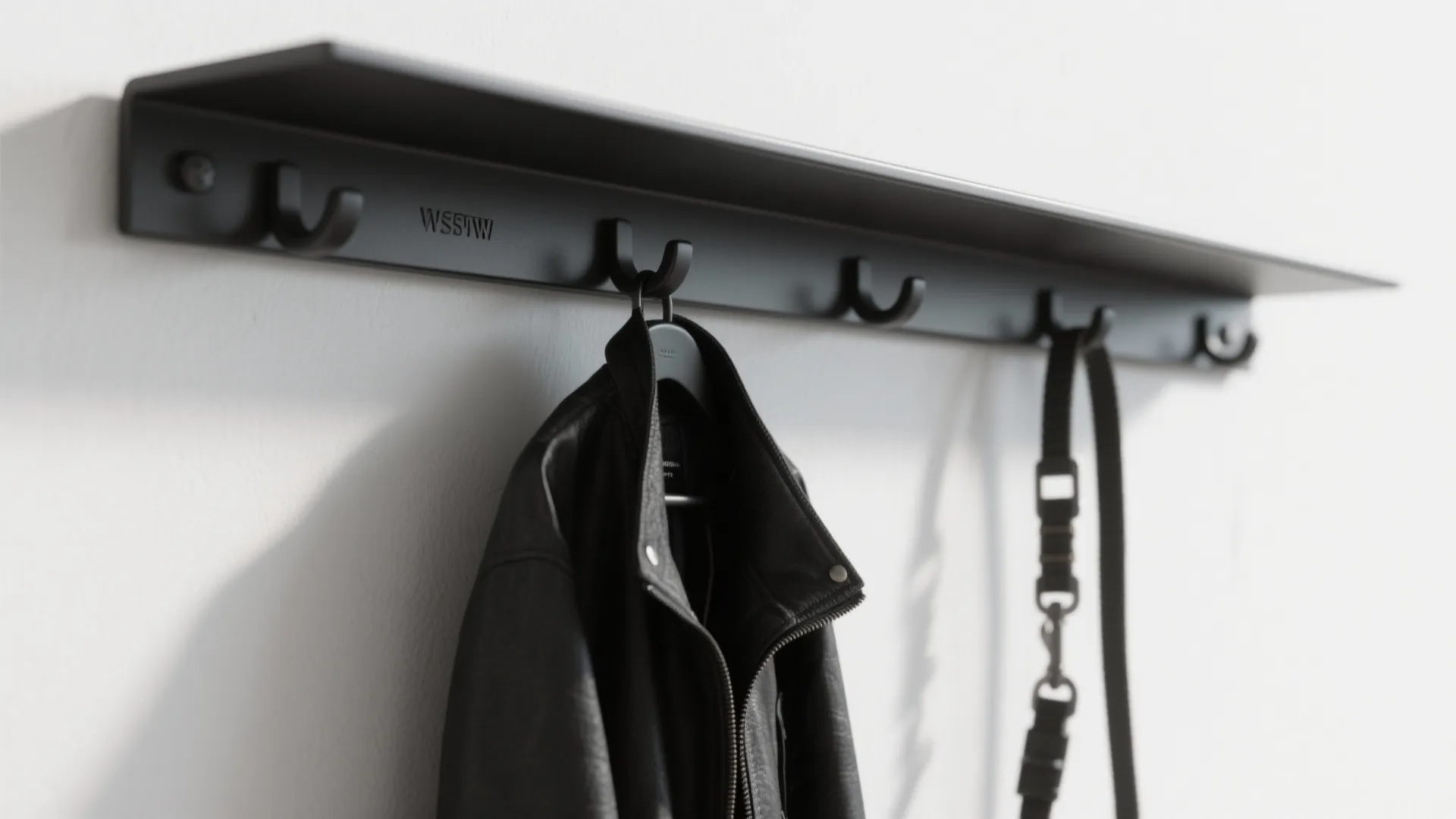 Minimalist metal bar with hidden hooks