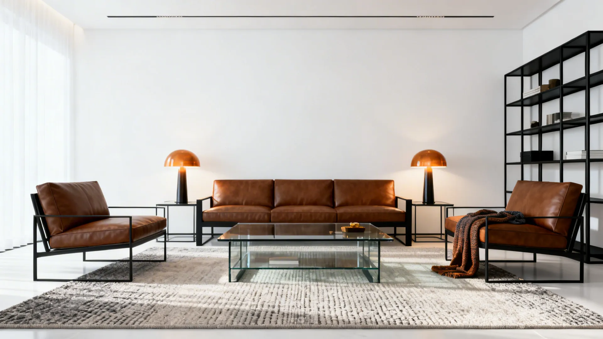 Sleek brown seating with black metal frames, glass coffee table and white walls in a minimalist living room.