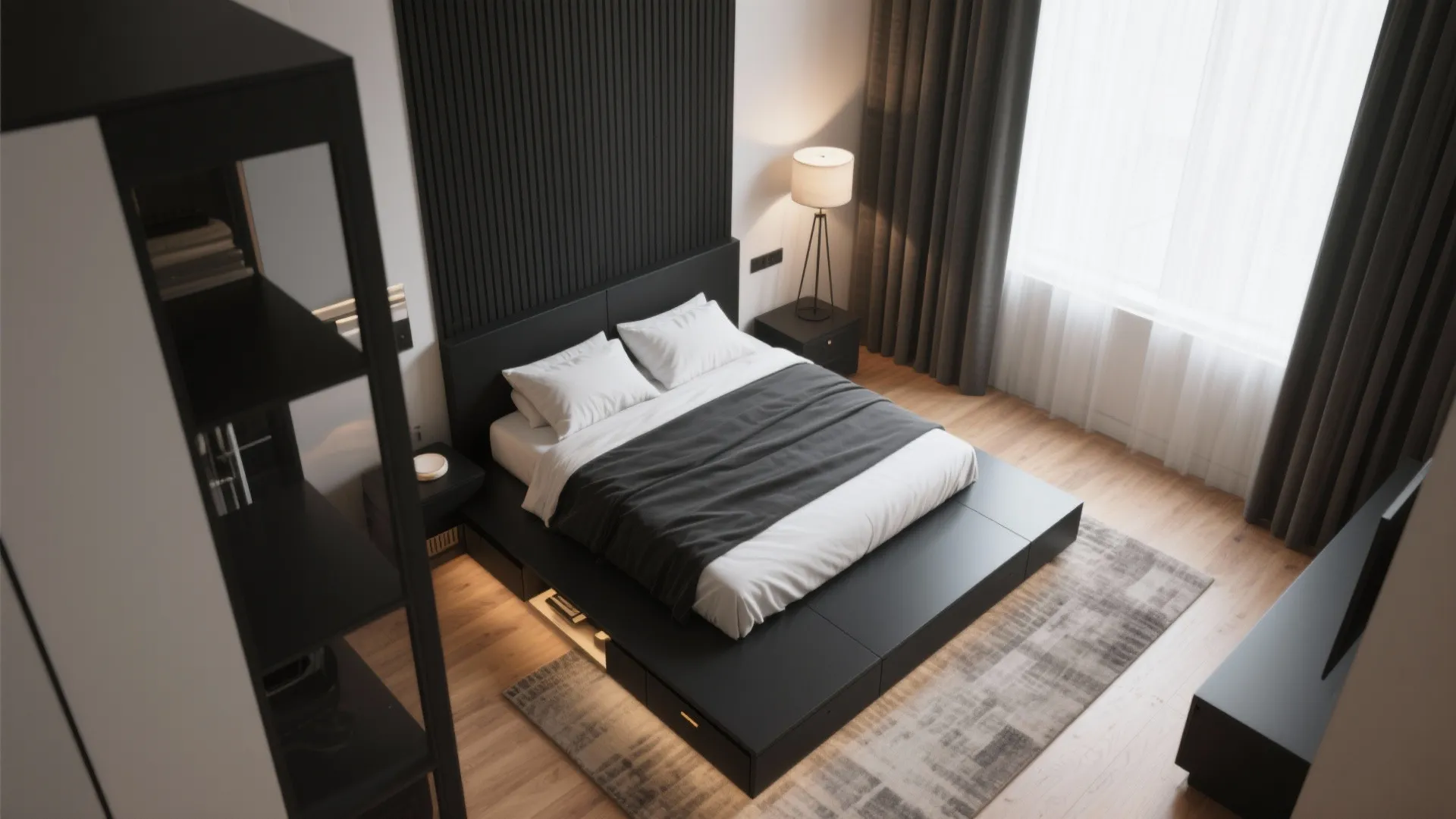 Modern black platform bed with white pillows grey blanket floor lamp wooden floor and dark curtains