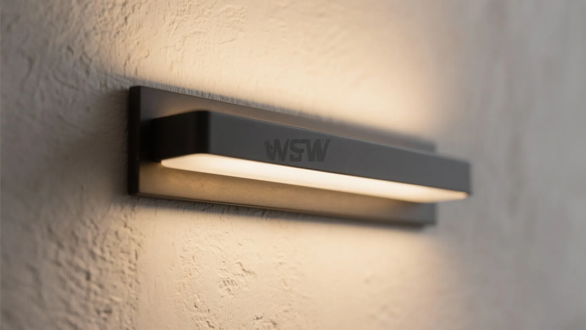 1) Minimal sconce lines that soften the perimeter
