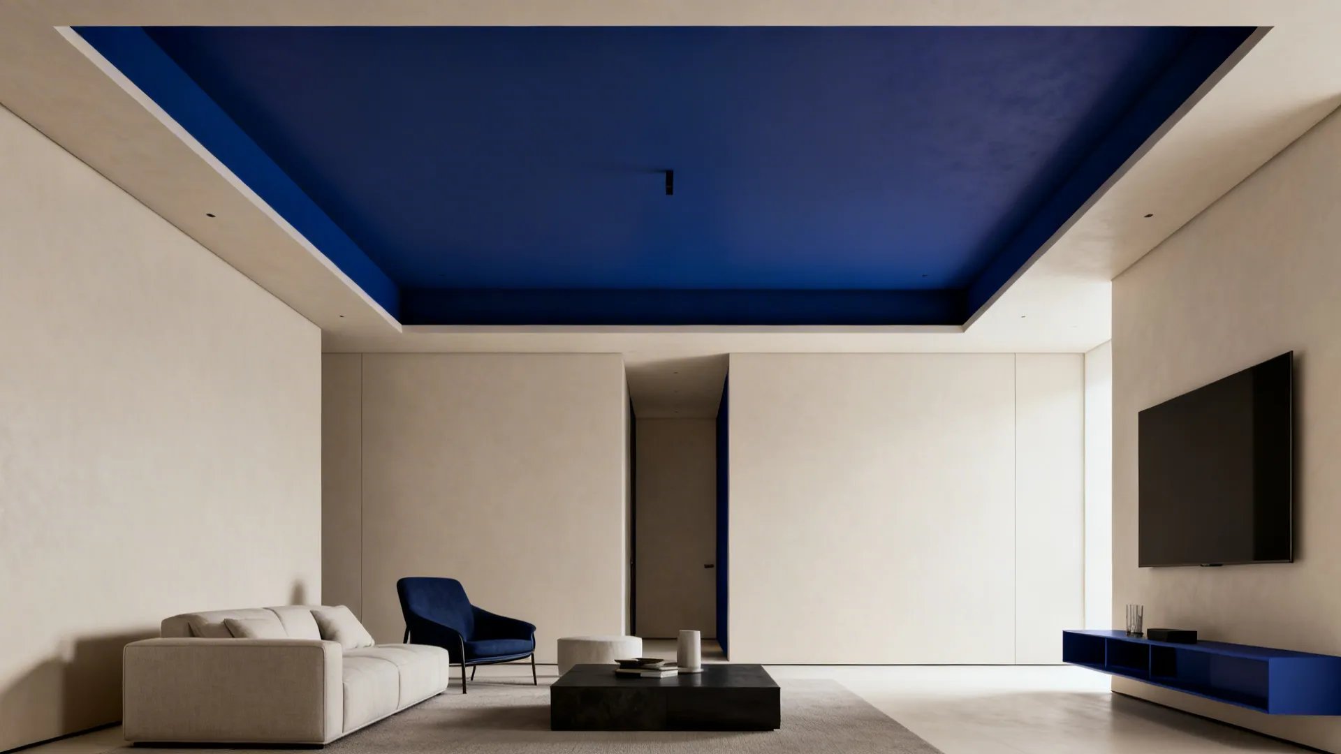 Small living room with a shallow tray POP ceiling featuring a deep accent paint in the recess for high-contrast effect.
