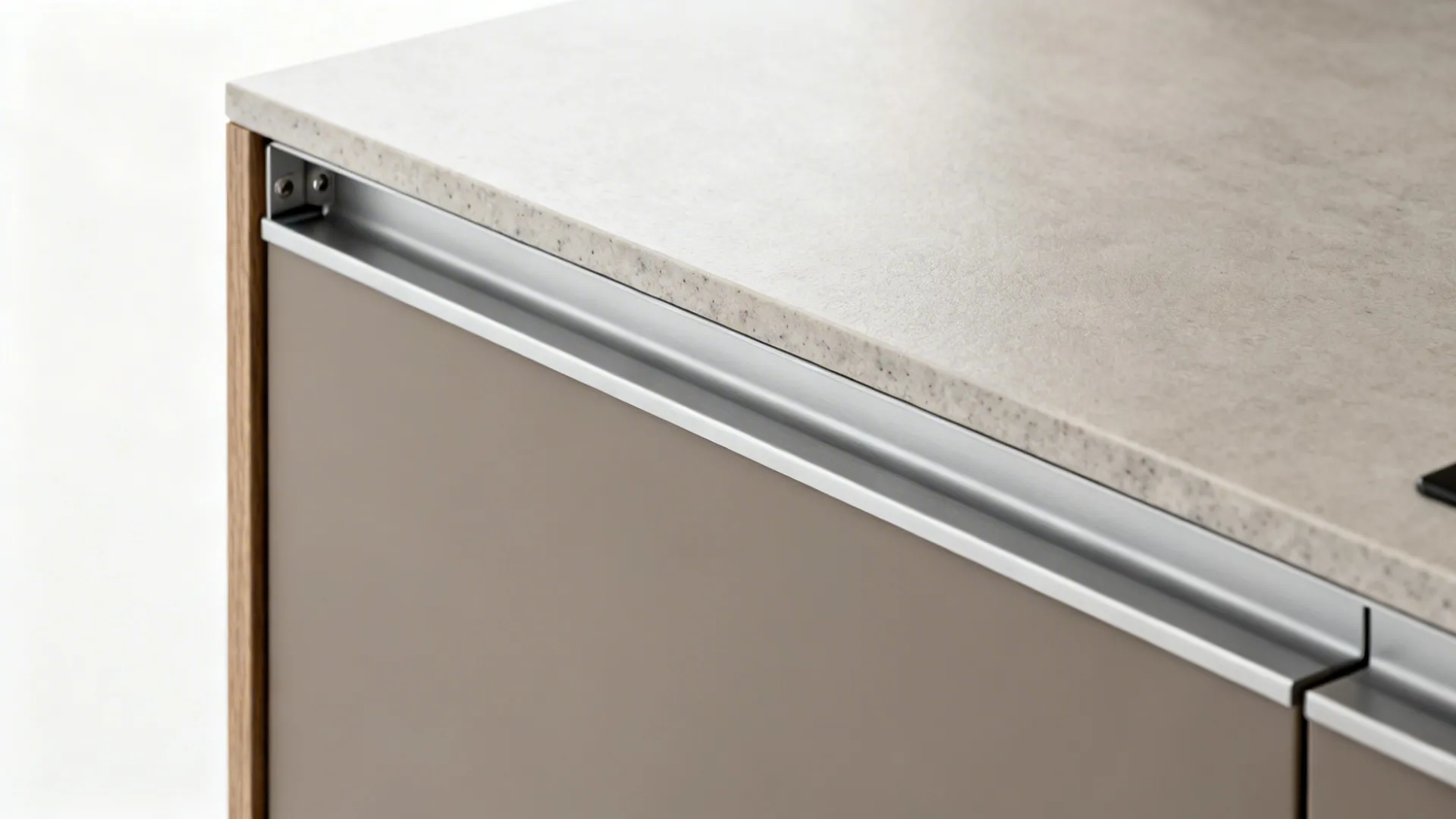Macro of handleless matte kitchen cabinet with aluminum G-profile and soft-close hardware.