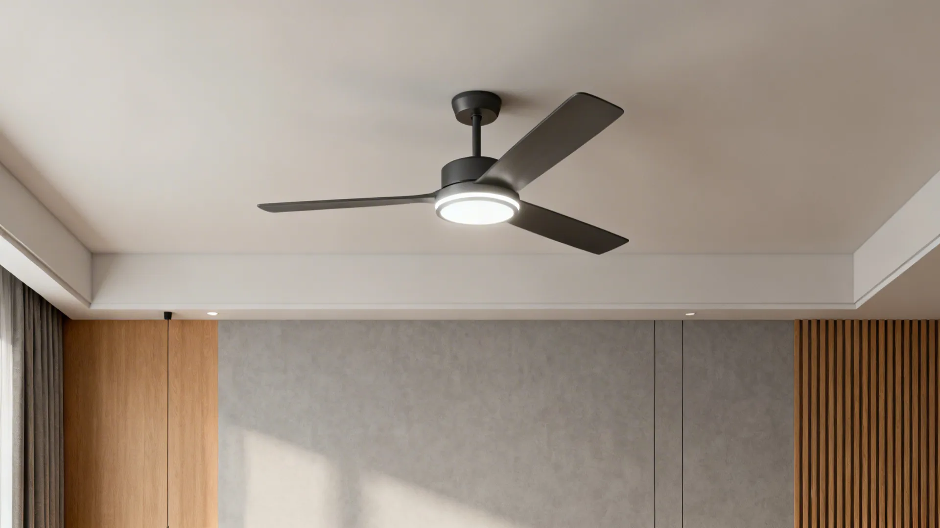 Modern three-blade ceiling fan with integrated LED light in a minimalist living room