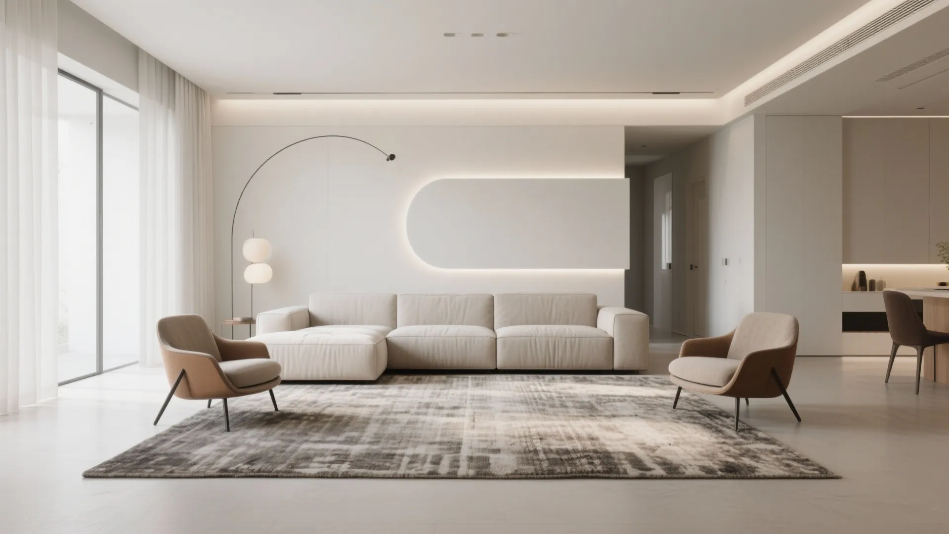 Minimalist white living room featuring a long cream sofa two armchairs and a grey rug