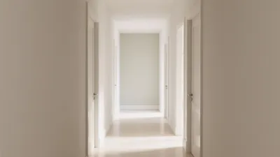 Serene Neutral Hallway Design with Natural Light