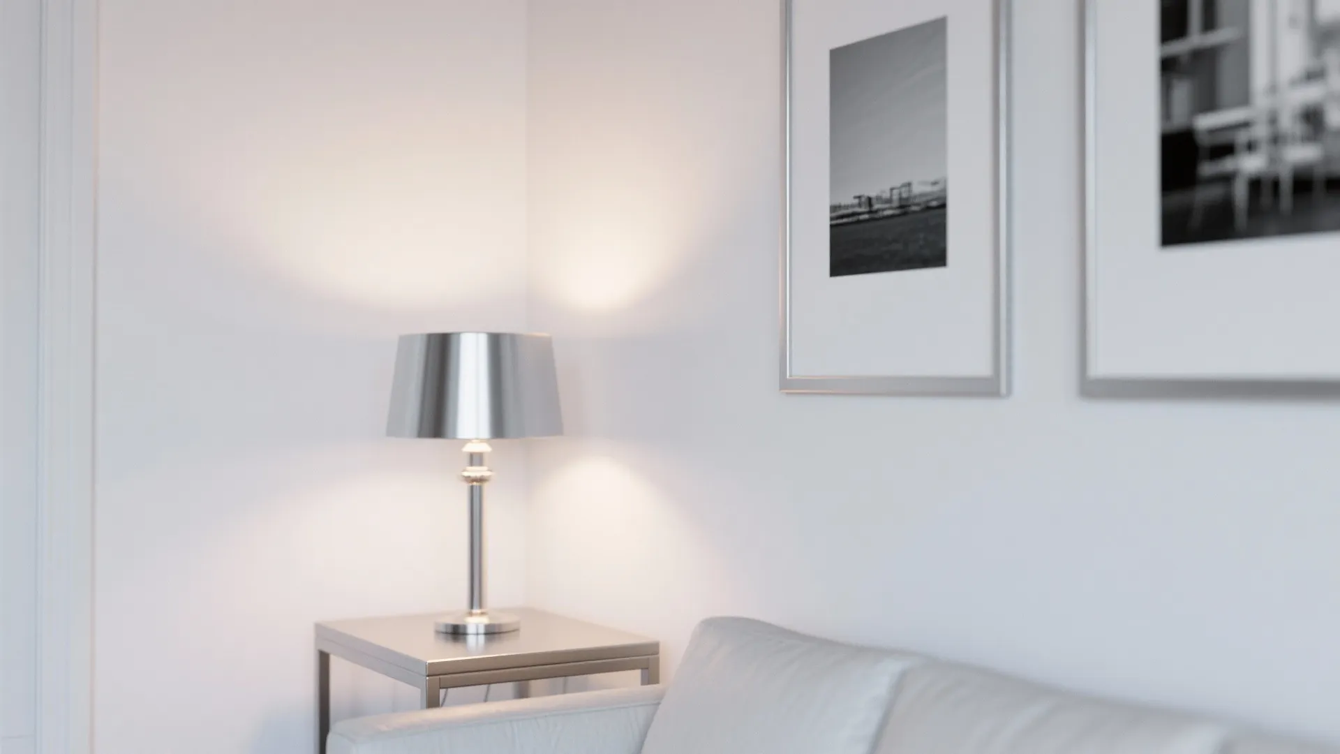 Minimalist living room corner with brushed silver accents