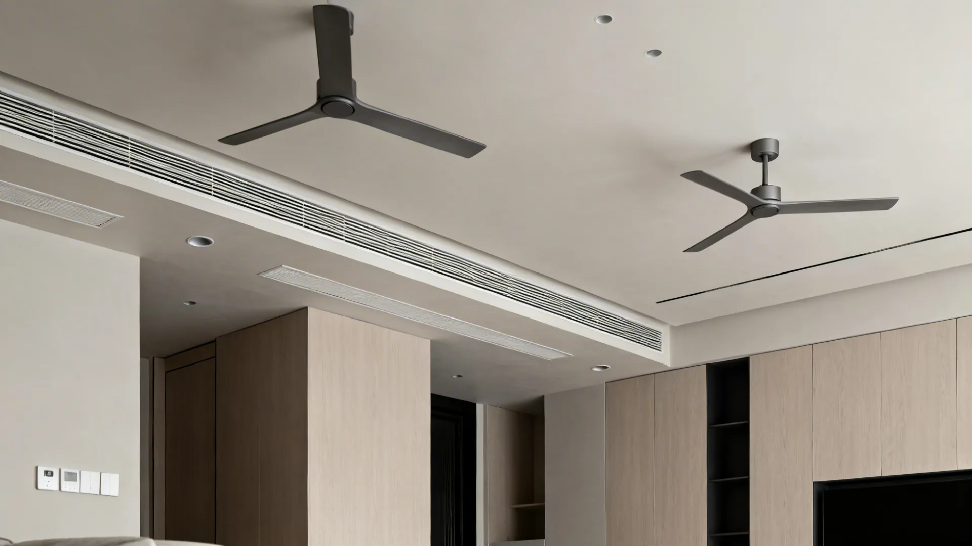 Minimalist ceiling with linear slot diffusers, micro-coves, and two ultra-slim fans in a tech-forward living room.