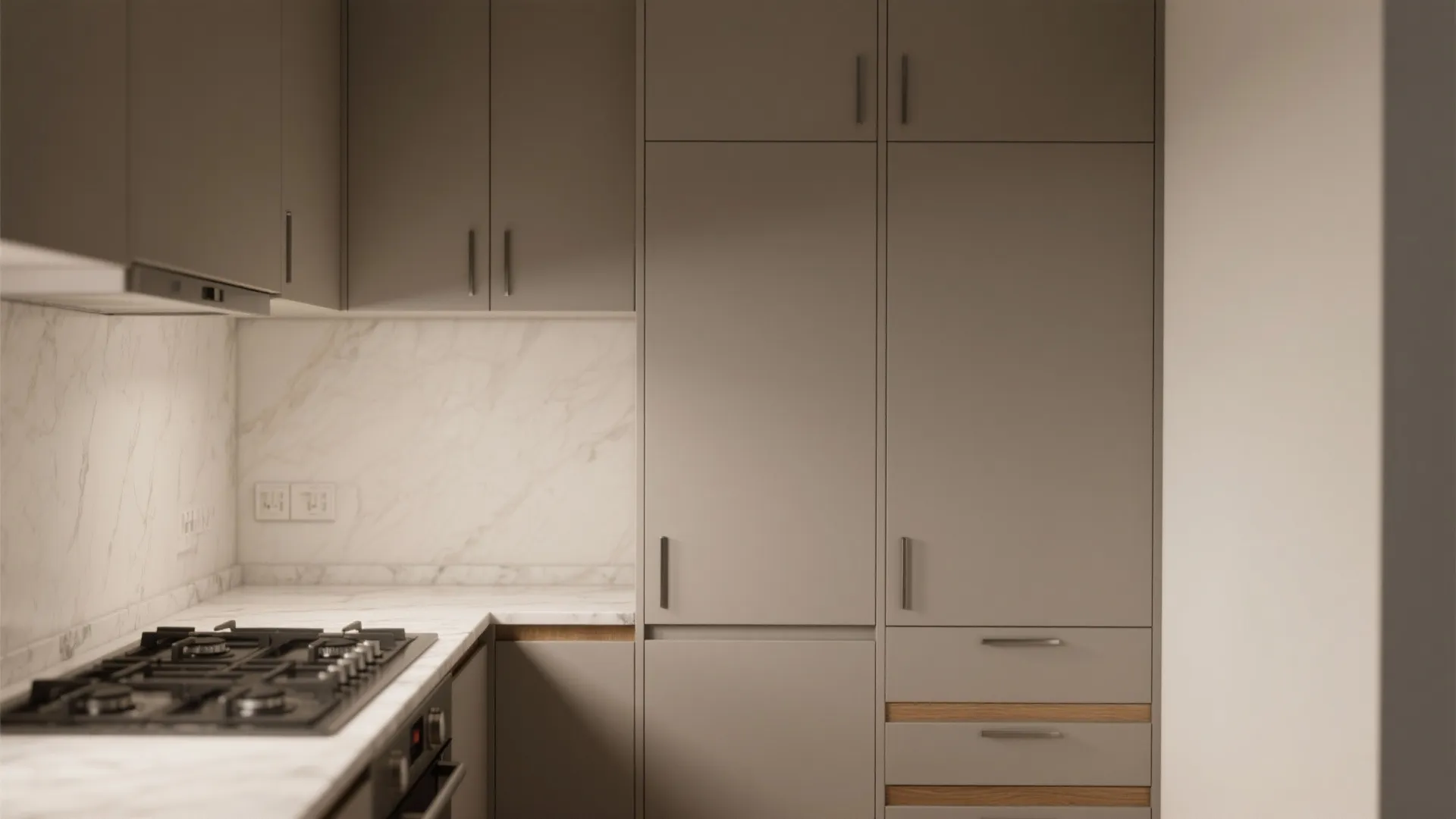 Modern kitchen with grey floor-to-ceiling cabinets, marble backsplash, gas stove, and clean minimalist interior design