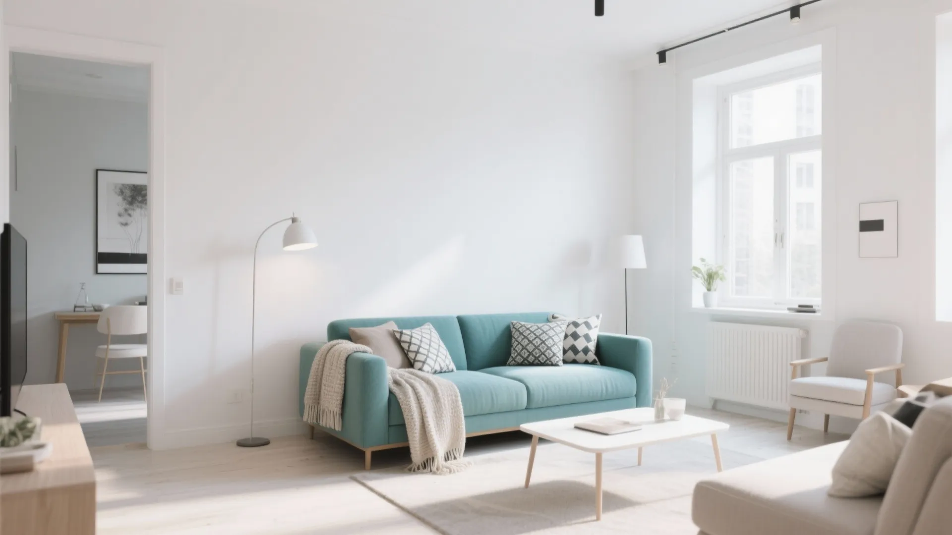 1. Minimalist Layout with a Teal Sofa