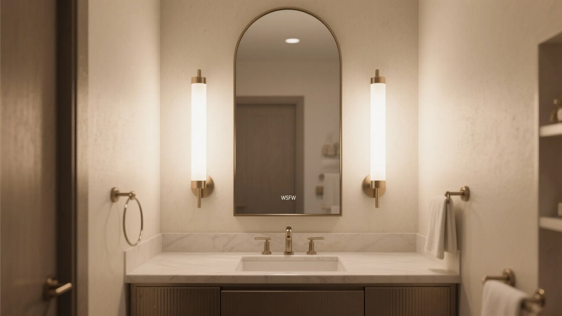 High-Impact Mirror and Vertical Sconce Layering