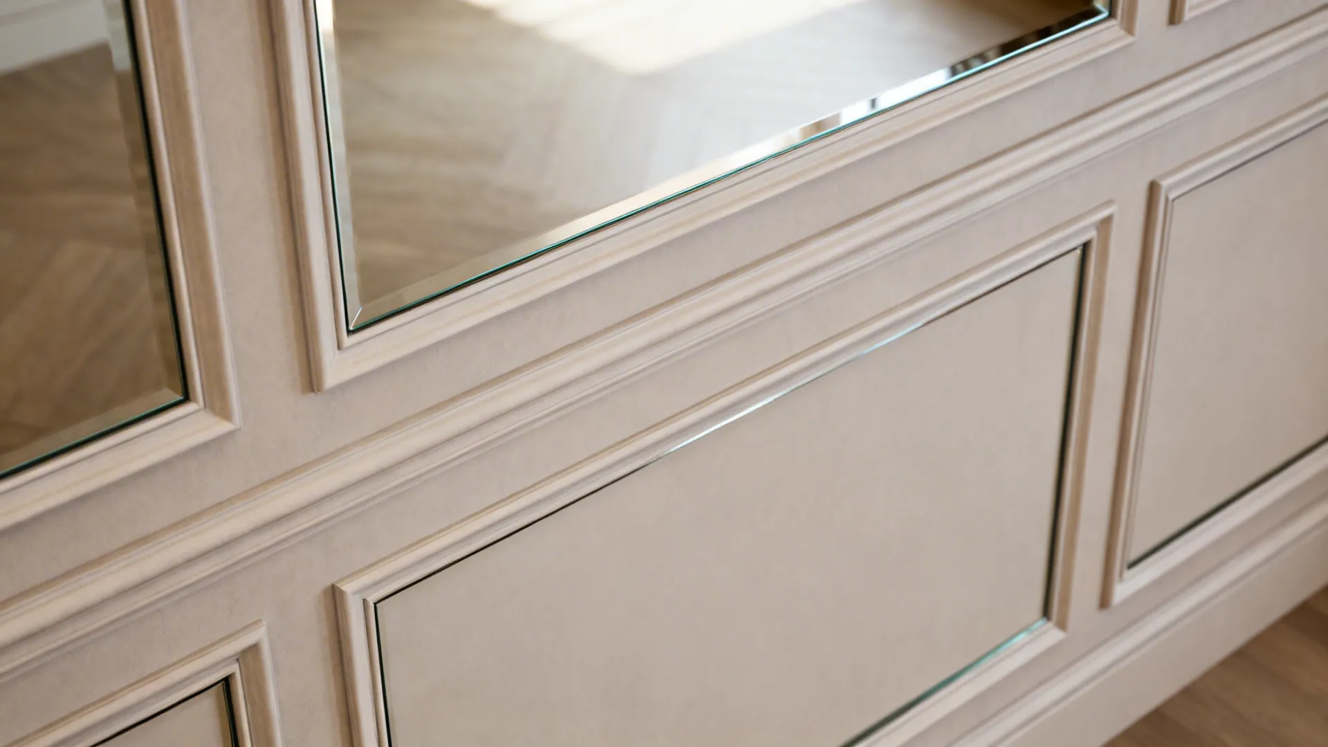 Slim mirrored panels inset between wall trims creating a refined dining wall backdrop