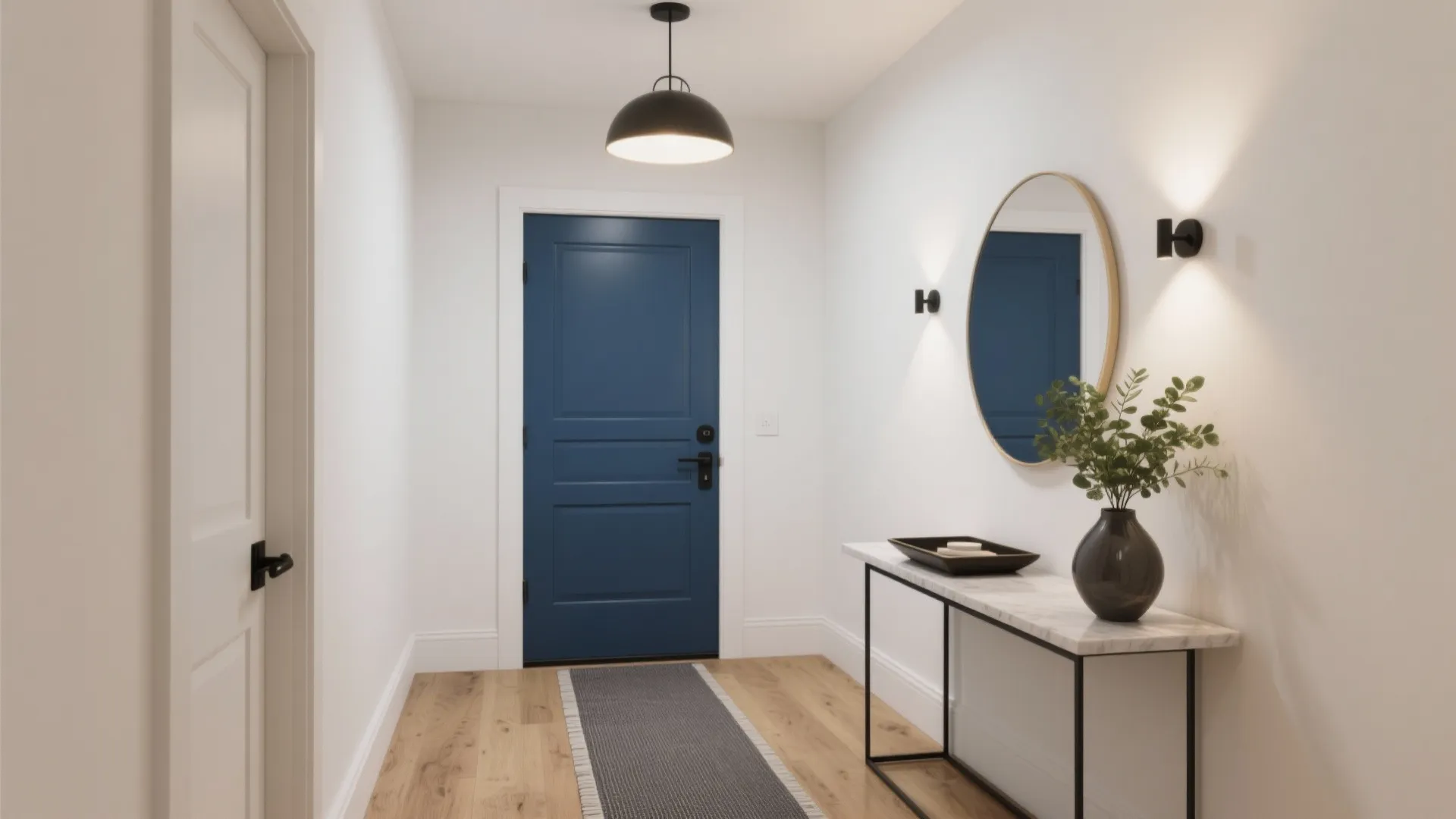 Modern entryway with blue front door white walls black ceiling light round mirror and table