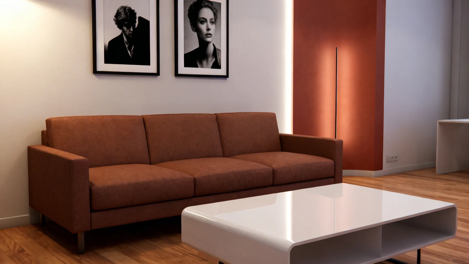 Modern living room with brown sofa white coffee table wood floor and two framed portraits