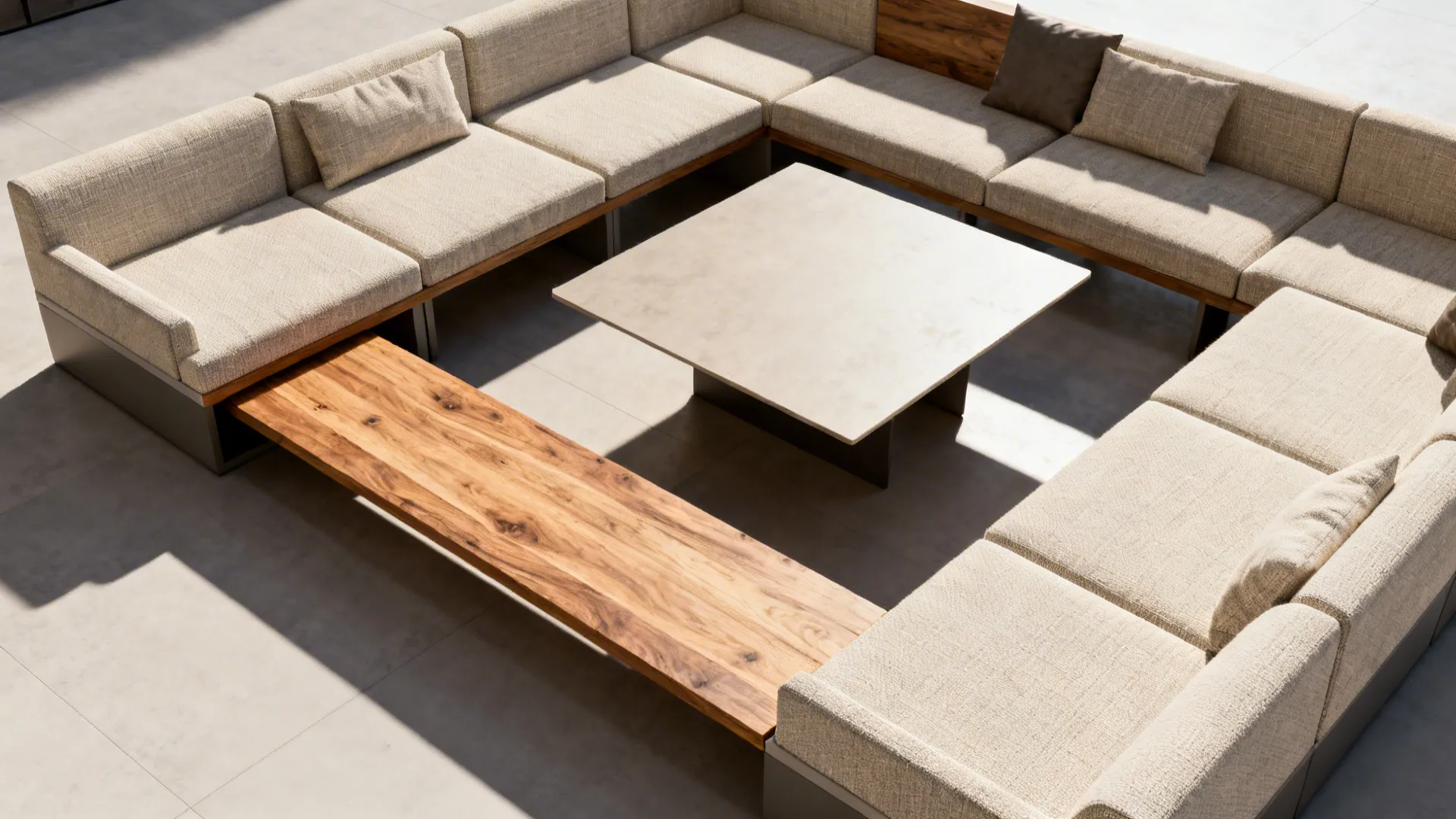 Top-down layout of a modular sofa with a backless bench tucked under a table for flexible seating.