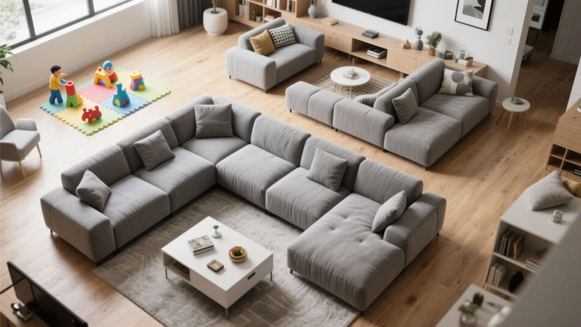 Spacious living room layout with large grey sofa wooden floor play area and white table