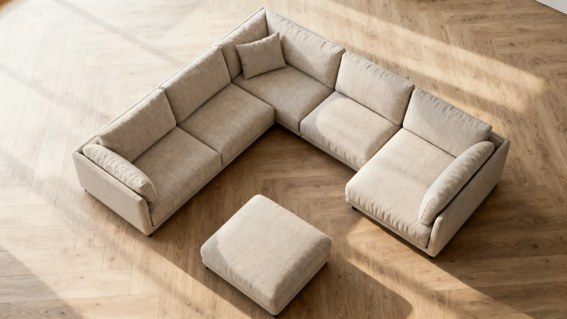 Top-down layout showing a modular L-shaped sofa in alternate configurations with clear walkways.