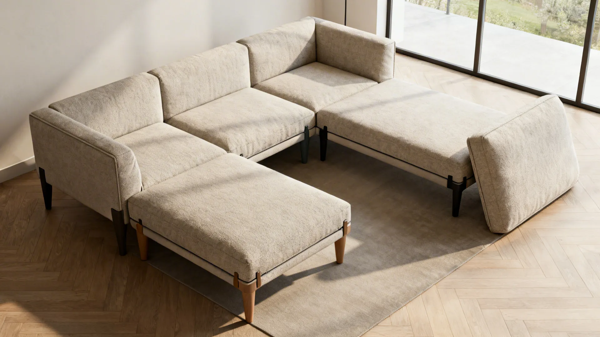 Small living room with modular sectional pieces arranged to show reconfigurable layouts