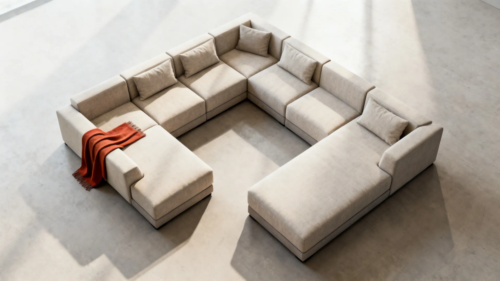 Top-down view of modular sofa pieces arranged in multiple configurations for flexibility.