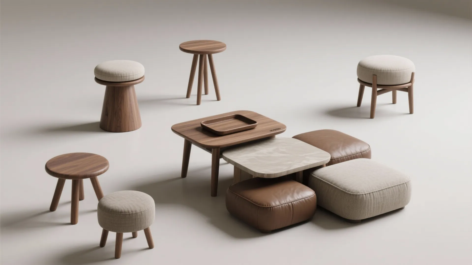 Group of various wooden stools, low coffee tables, and floor cushions on a white background