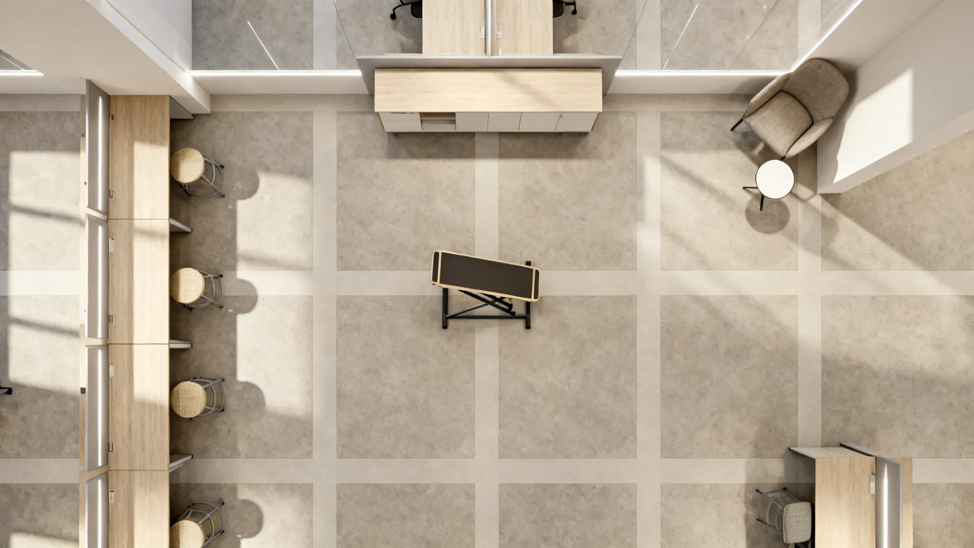 Top down interior design drawing of an office layout with desks, stools, armchair, and cabinet