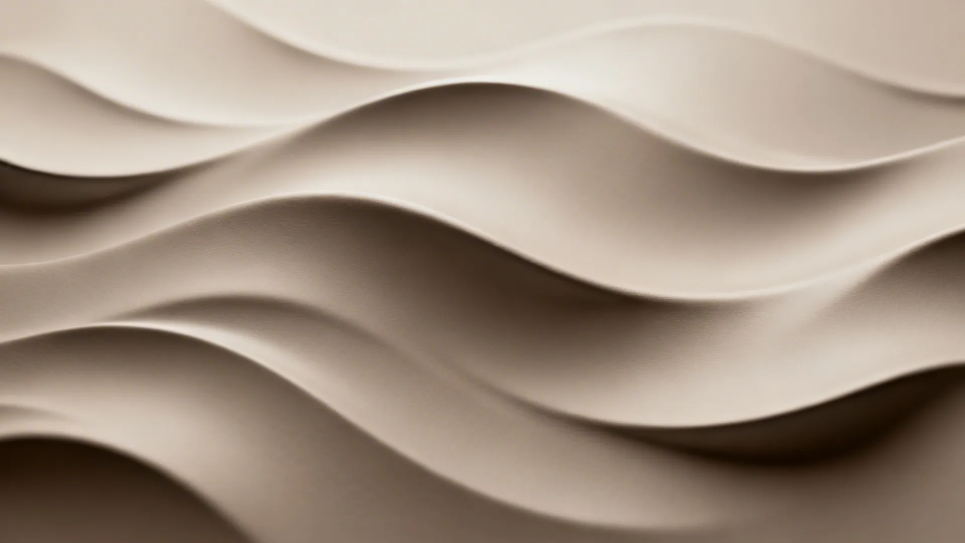 Macro of a monochrome 3D wave mural with gentle contours and soft gradients.