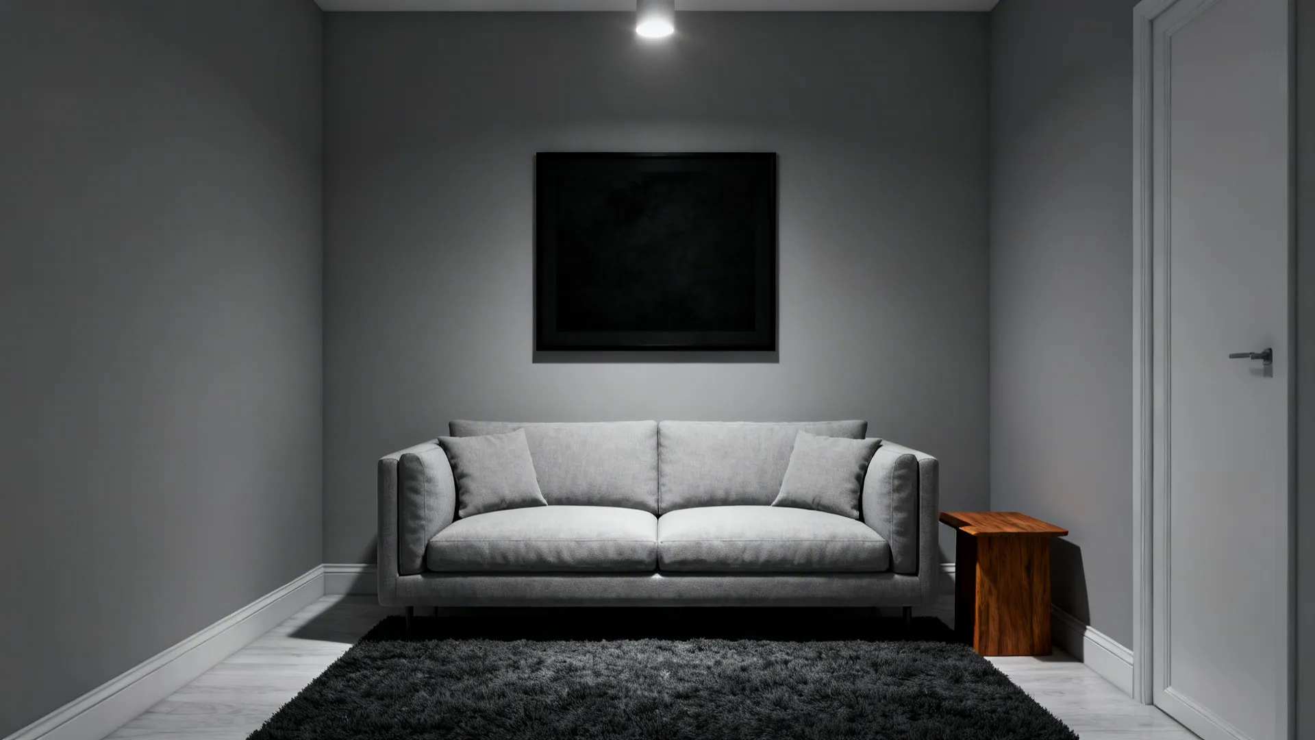 Layered monochrome greys with charcoal accents and a wooden side table in an Agreeable Gray room.