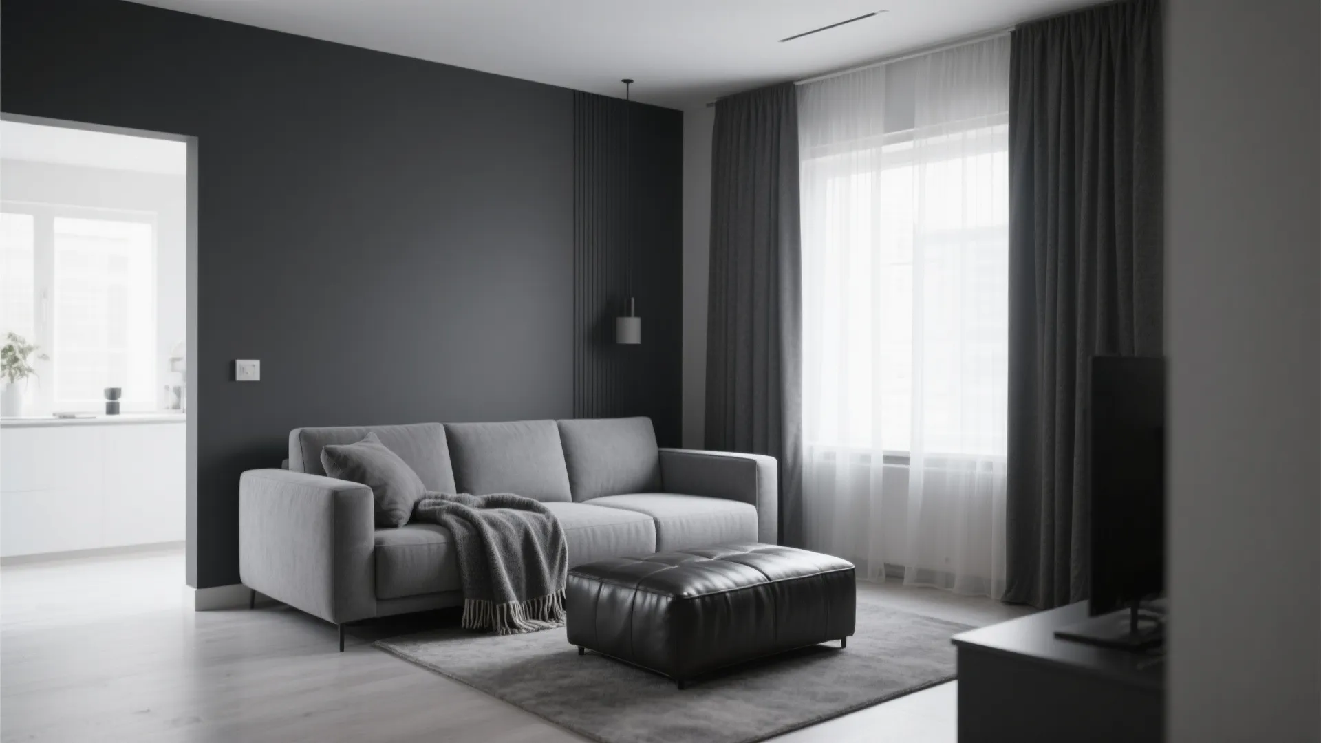 Charcoal and grey minimalist living room with textured accents
