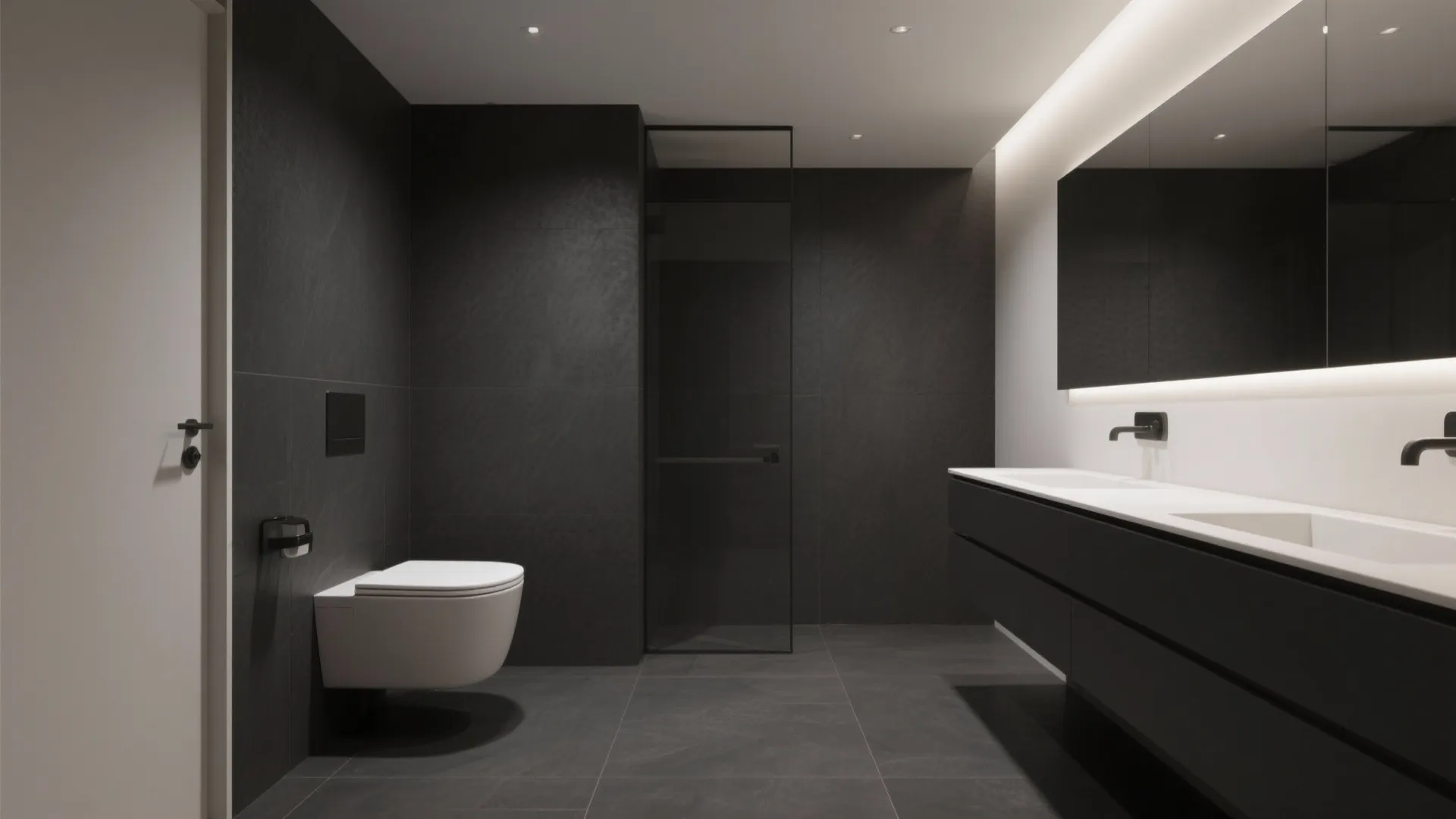 Modern dark bathroom with black matte tiles, white wall toilet, dark cabinet, and large mirror