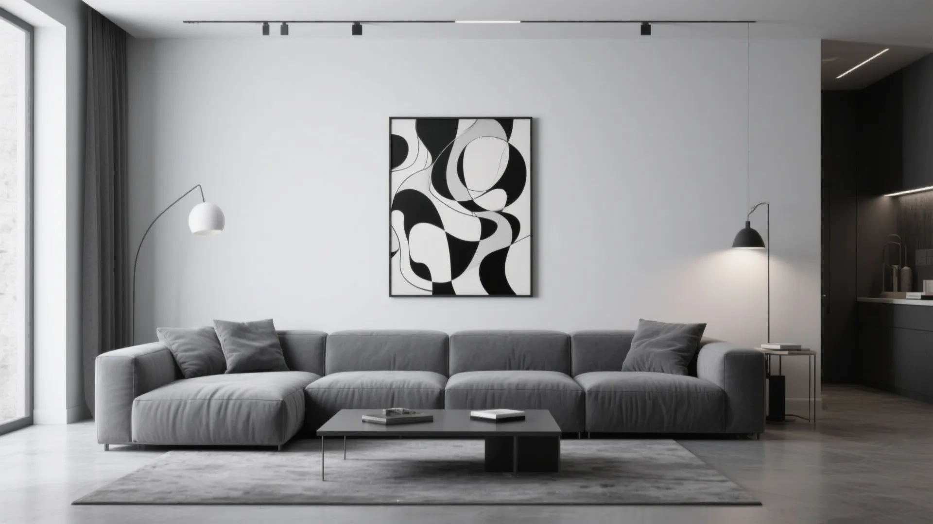 Modern grey sofa in living room with black and white wall art and floor lamps