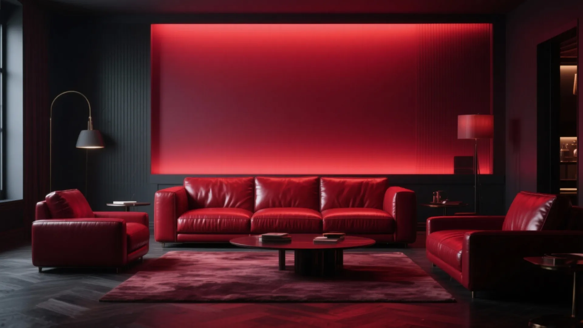 Red sofa against gradient red wall in dramatic setting