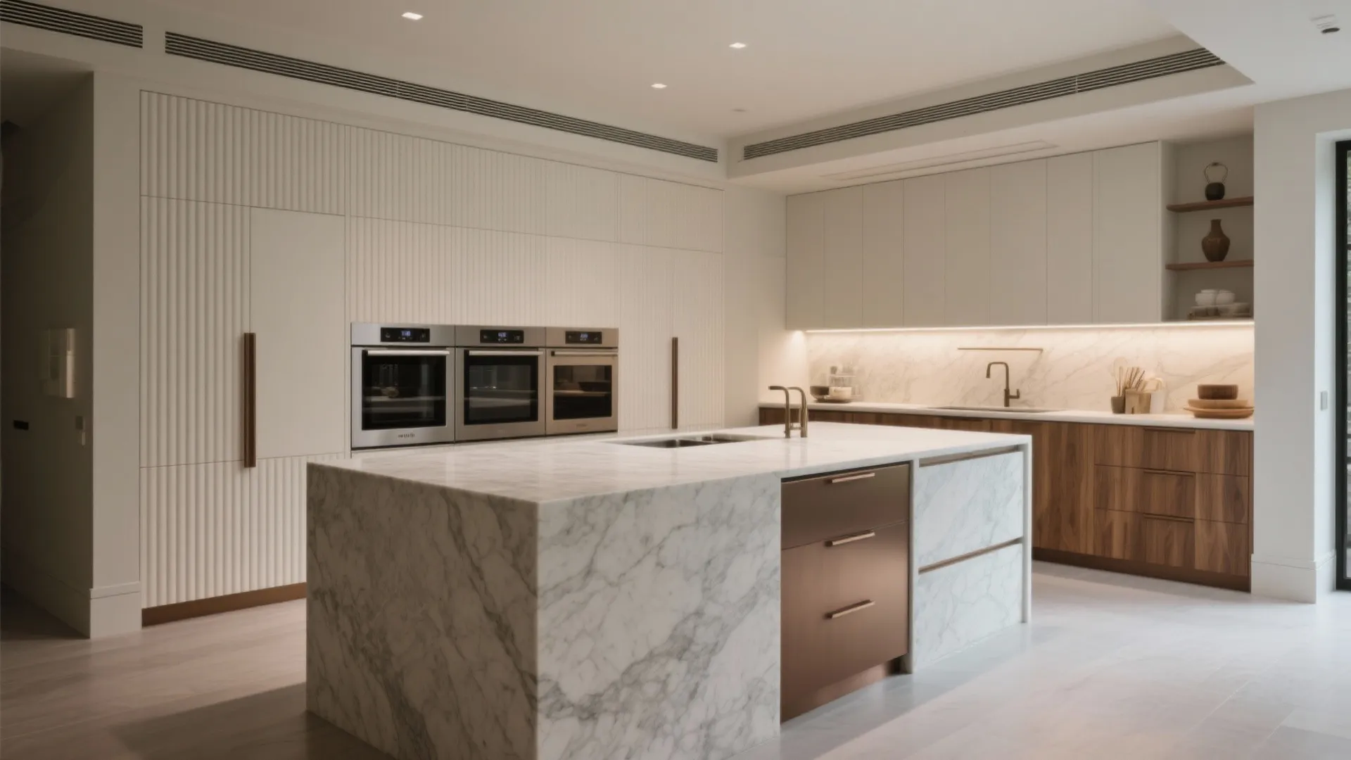 Monolithic Stone Kitchen with Hidden Scullery