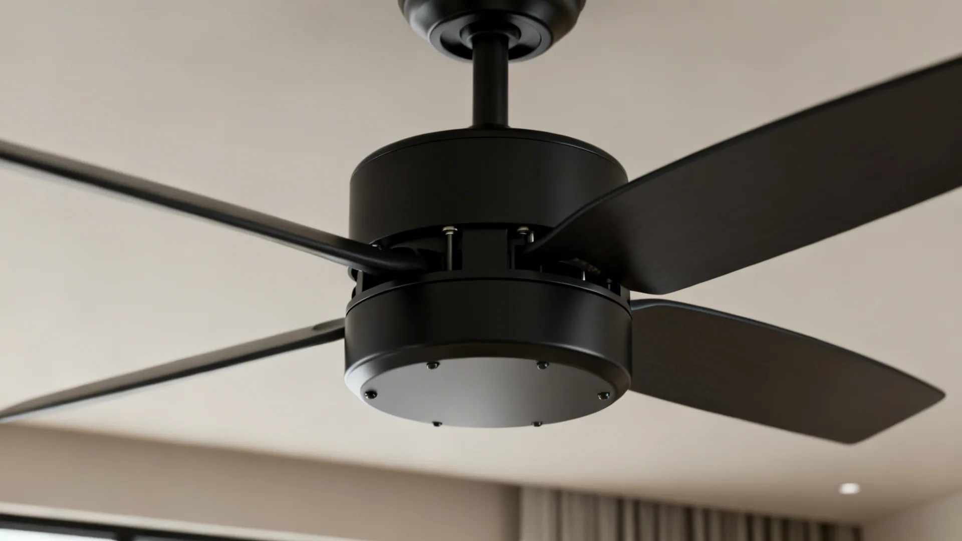 Close-up of a black fan motor and blade pitch highlighting performance-focused design