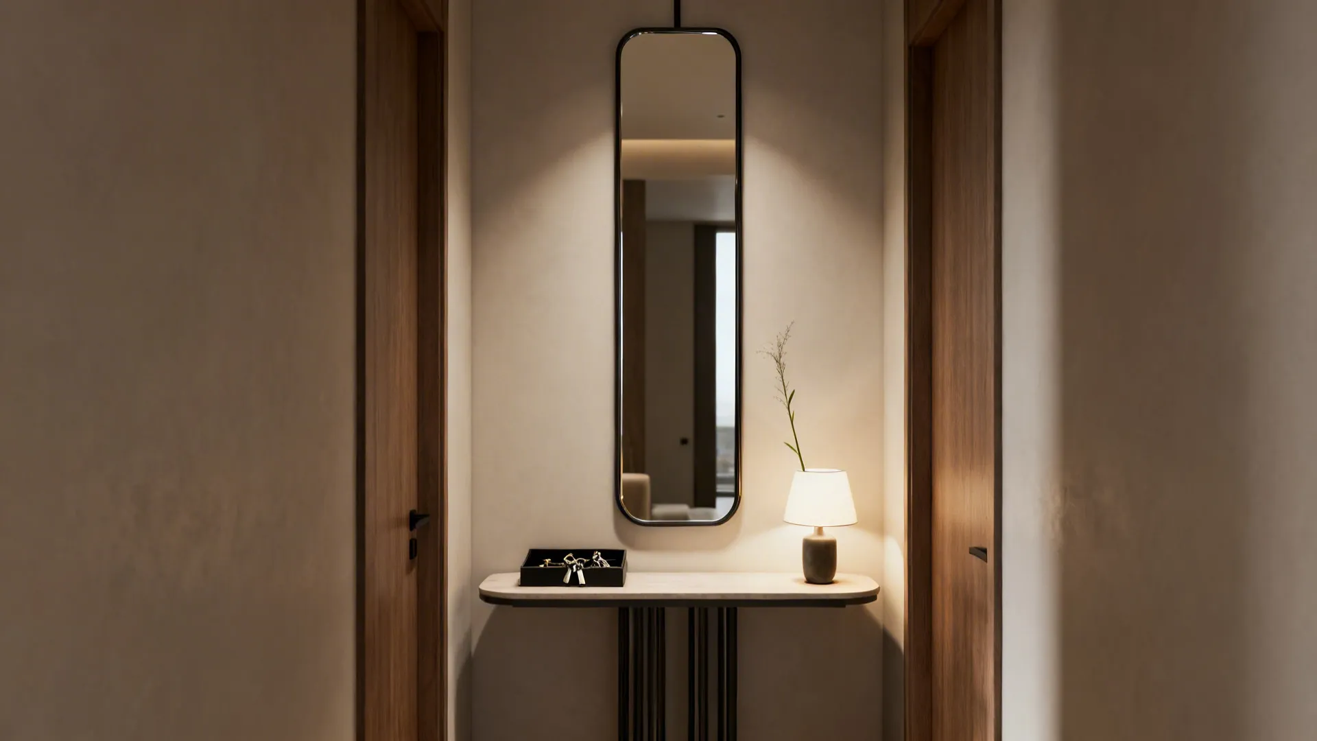 Narrow entry with a slim console table and a tall vertical mirror reflecting ceiling height.