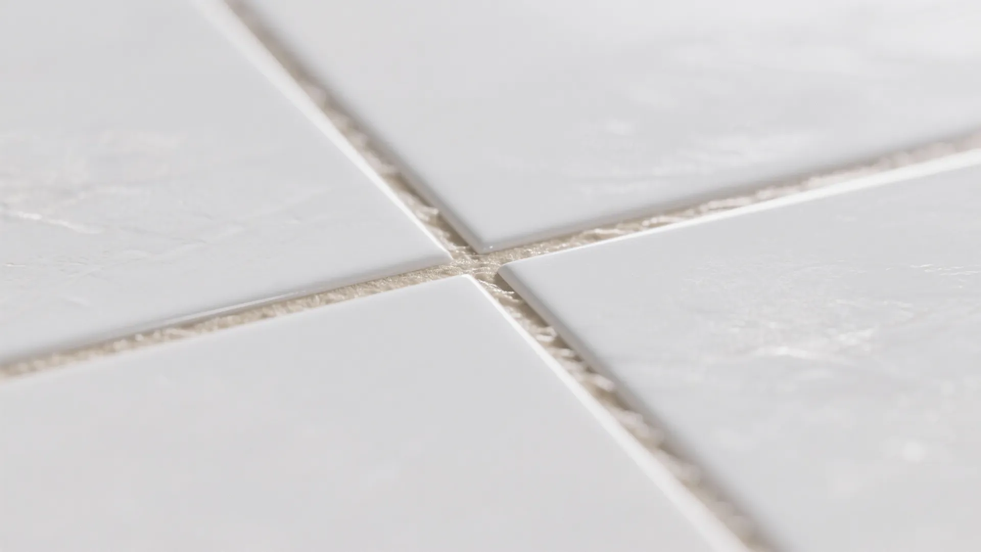 2. Use Minimal Grout Lines and Light-Colored Caulk