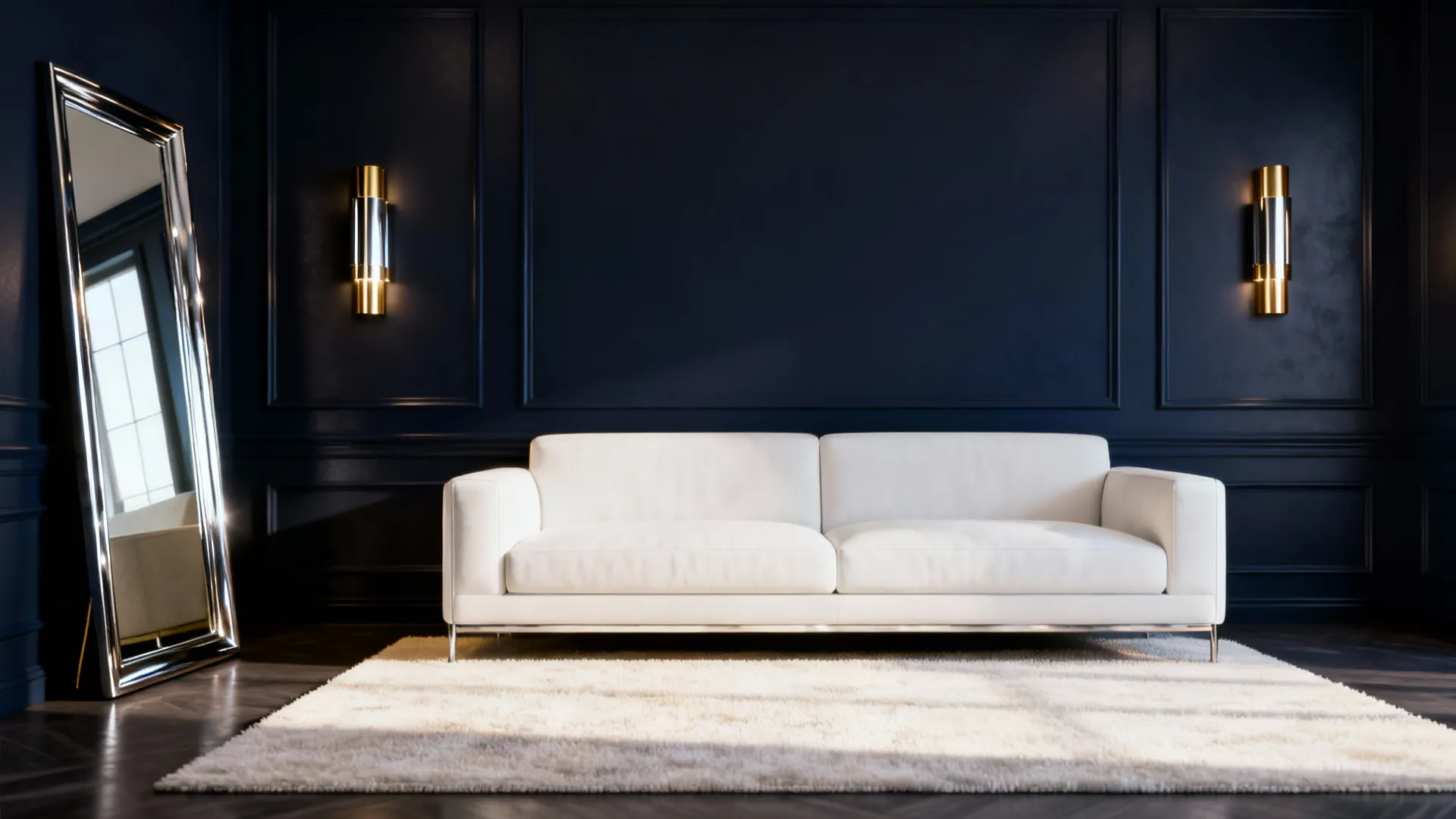 White sofa against navy blue wall panel with large leaning mirror and gold wall lights
