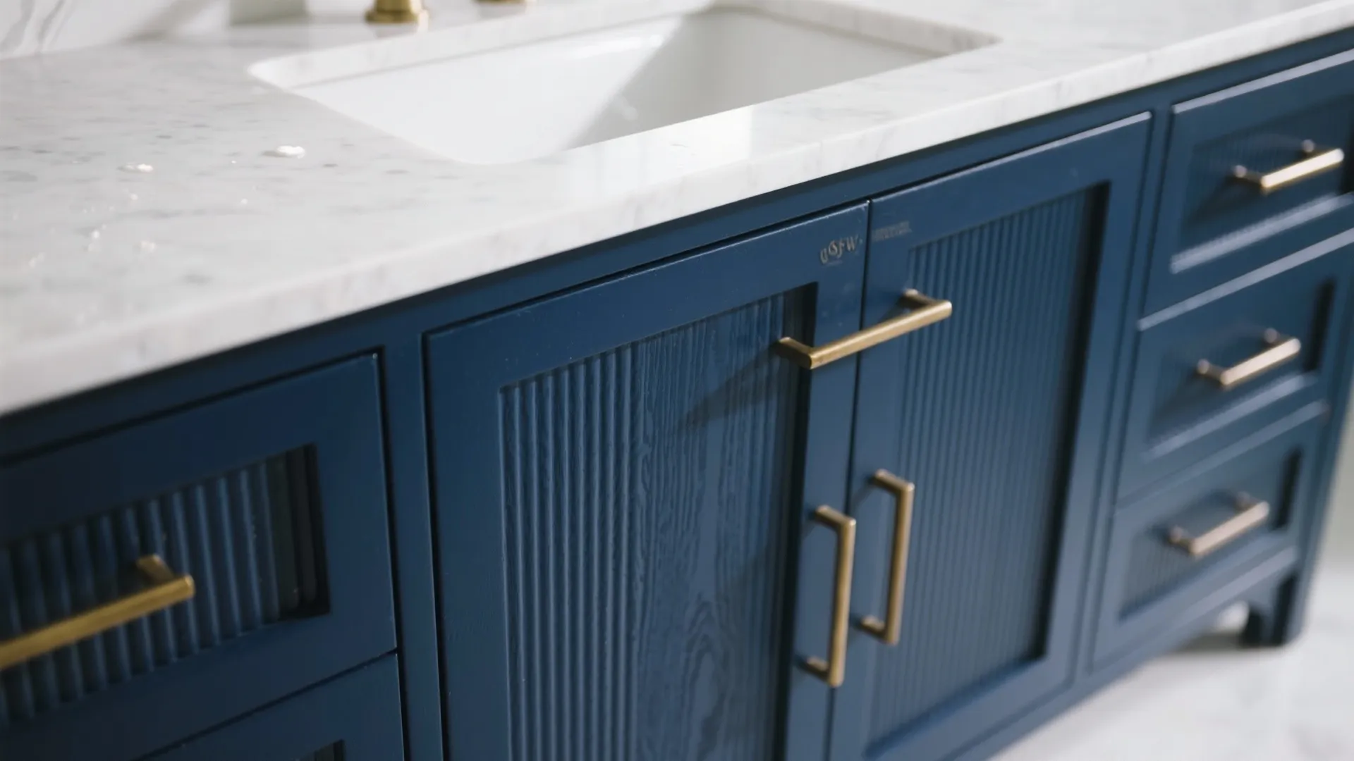 2) Navy Vanity + Brass Accents for Crisp Contrast